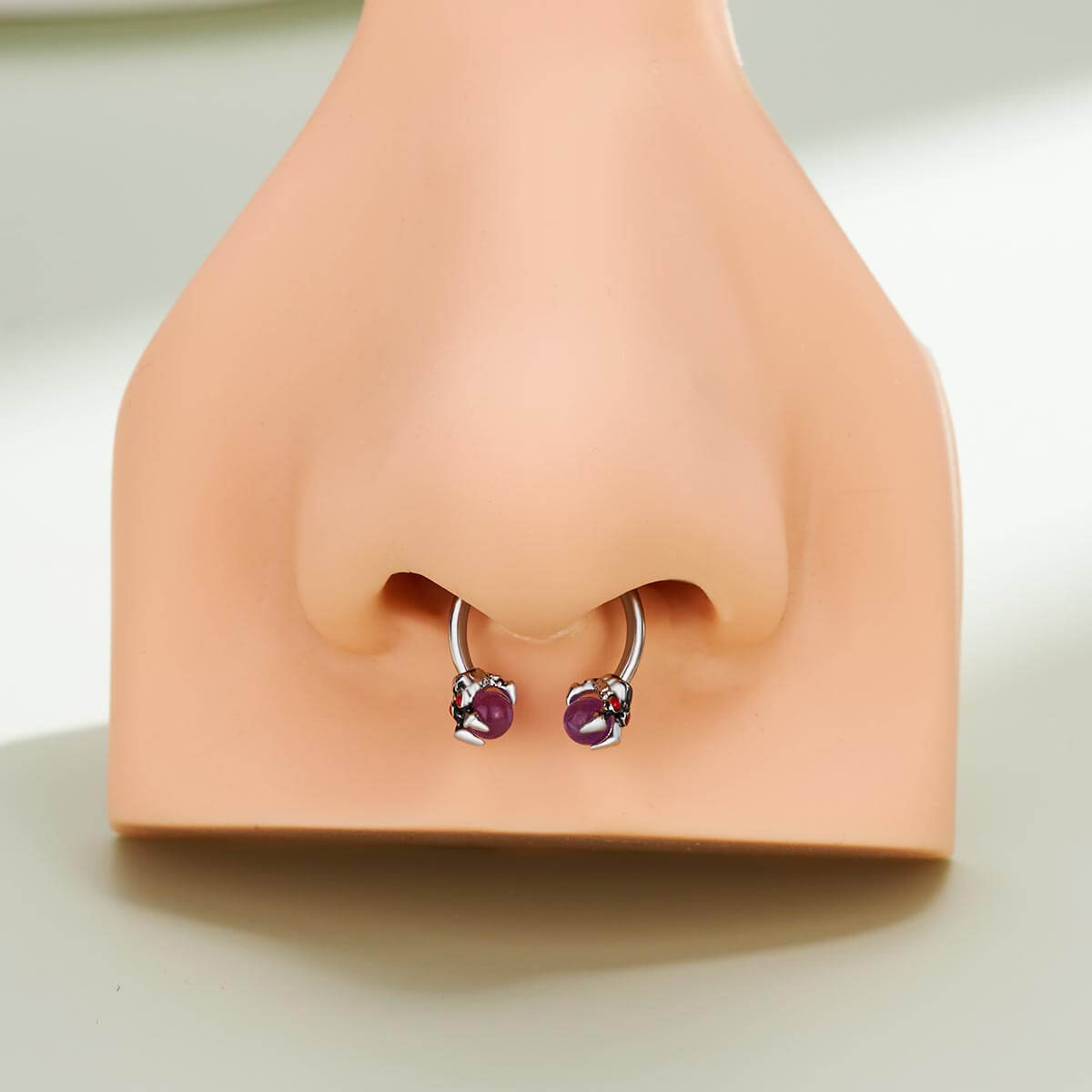 purple dragon septum piercing