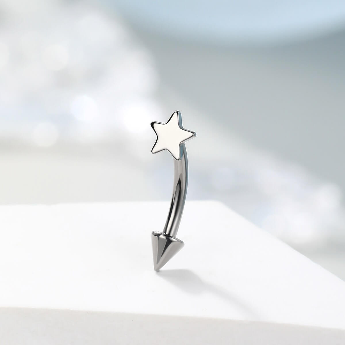 titanium star eyebrow ring