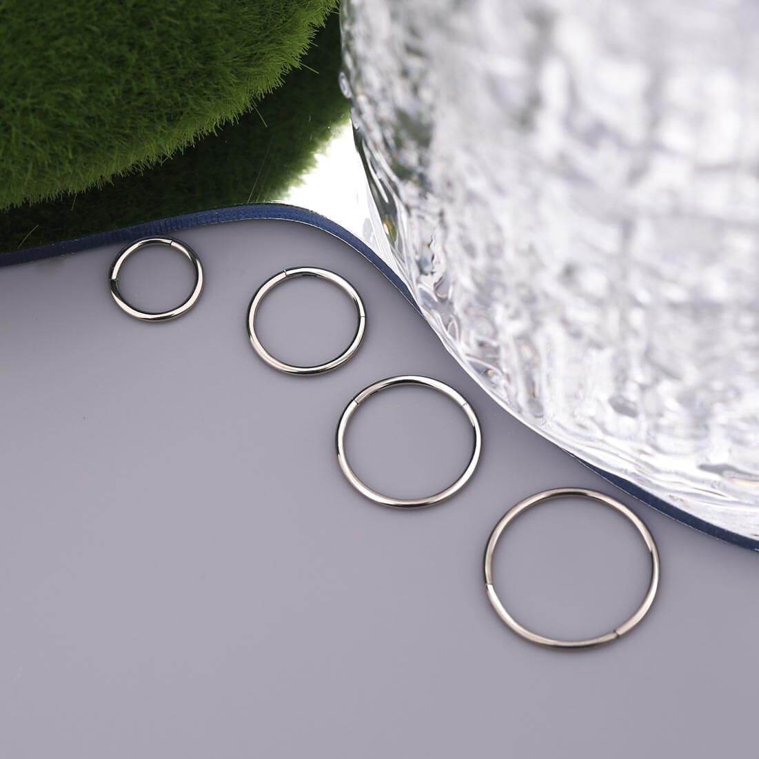 Titanium hinged nose deals ring