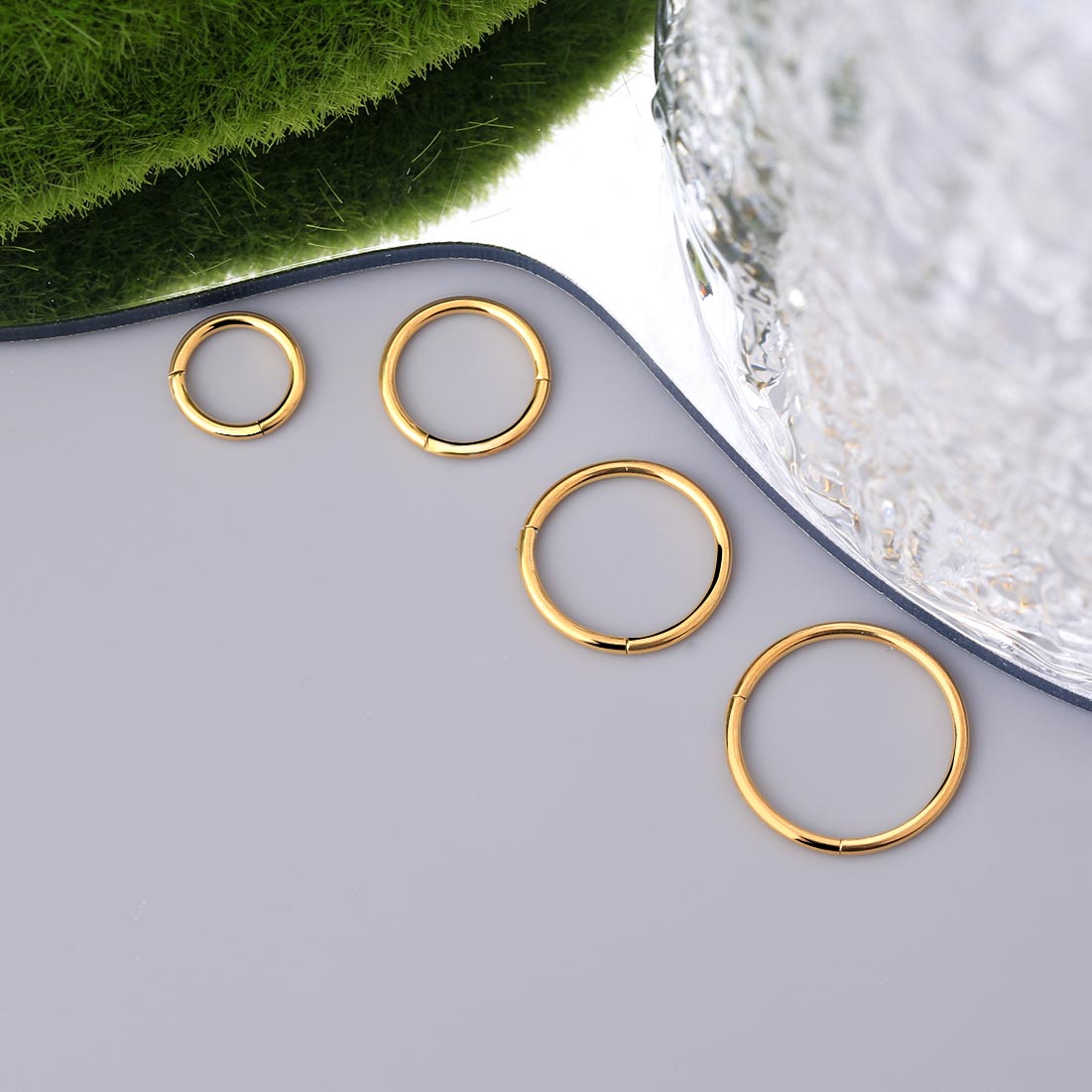 Gold hinged store nose ring